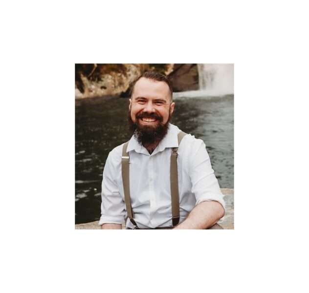 Professional headshot of counselor, John Wade.